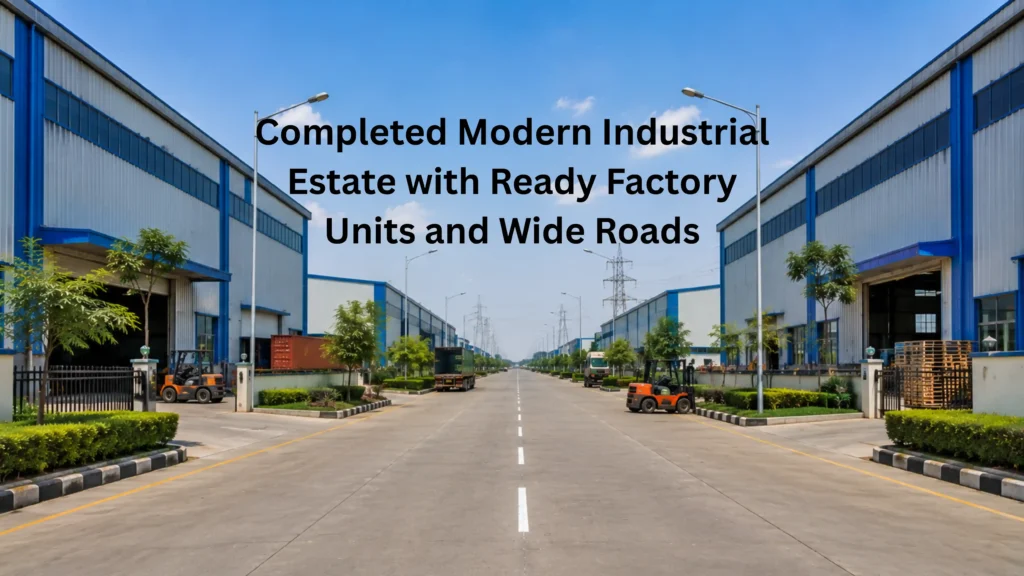 Fully developed modern industrial estate with factory warehouse buildings, wide internal roads, power setup, and organized layout representing the future of Sisana industrial zone near IMT Kharkhoda Kharkhoda