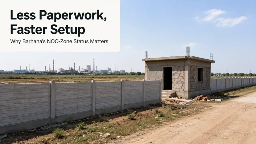 Boundary wall and basic structure on an open plot representing Barhana's NOC-zone approval process