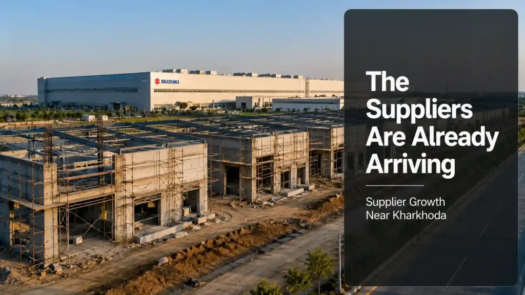 Smaller industrial units under construction beside a larger factory building, representing supplier growth near the Maruti Suzuki Kharkhoda plant