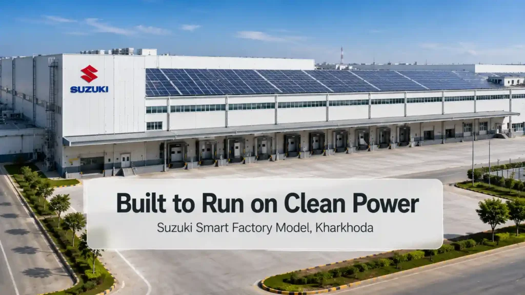 Modern factory exterior with rooftop solar panels, representing the Maruti Suzuki Kharkhoda plant's renewable-energy Smart Factory model